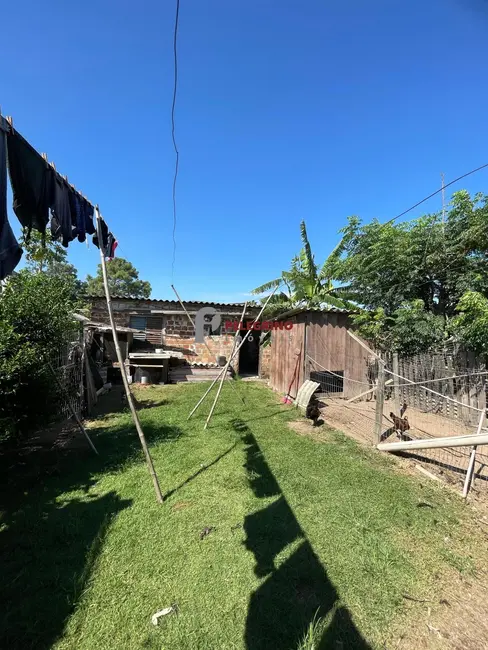 Casa com 2 quartos à venda, 106m2 em Tapes - RS - imagem 8 Foto 8 de Casa com 2 quartos à venda, 106m2 em Tapes - RS