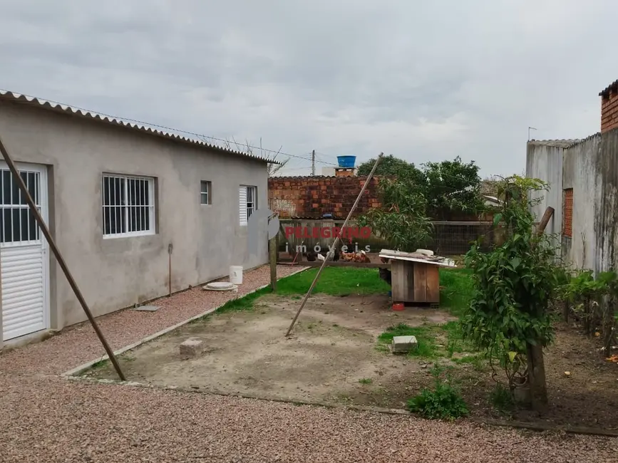 Foto 6 de Casa com 3 quartos à venda, 68m2 em Tapes - RS