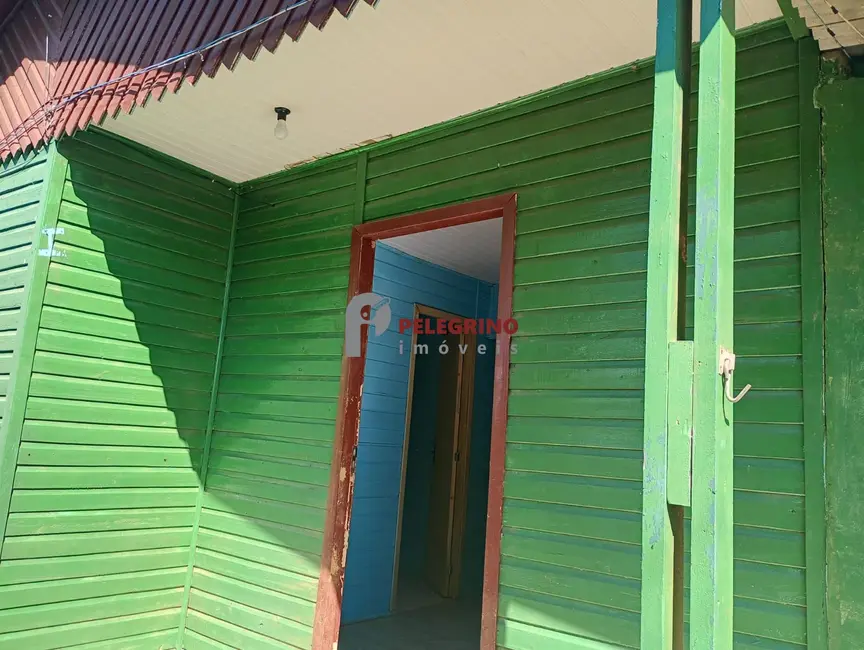 Foto 1 de Casa com 4 quartos à venda, 120m2 em Harmonia, Canoas - RS