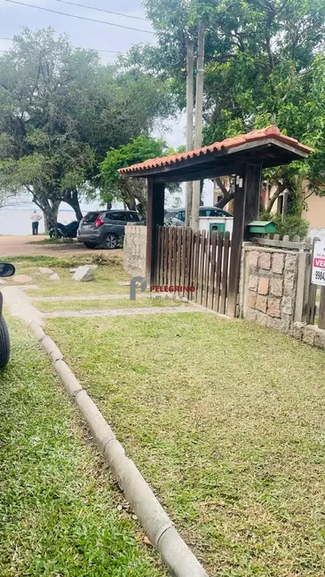 Foto 1 de Casa com 2 quartos à venda, 102m2 em Tapes - RS