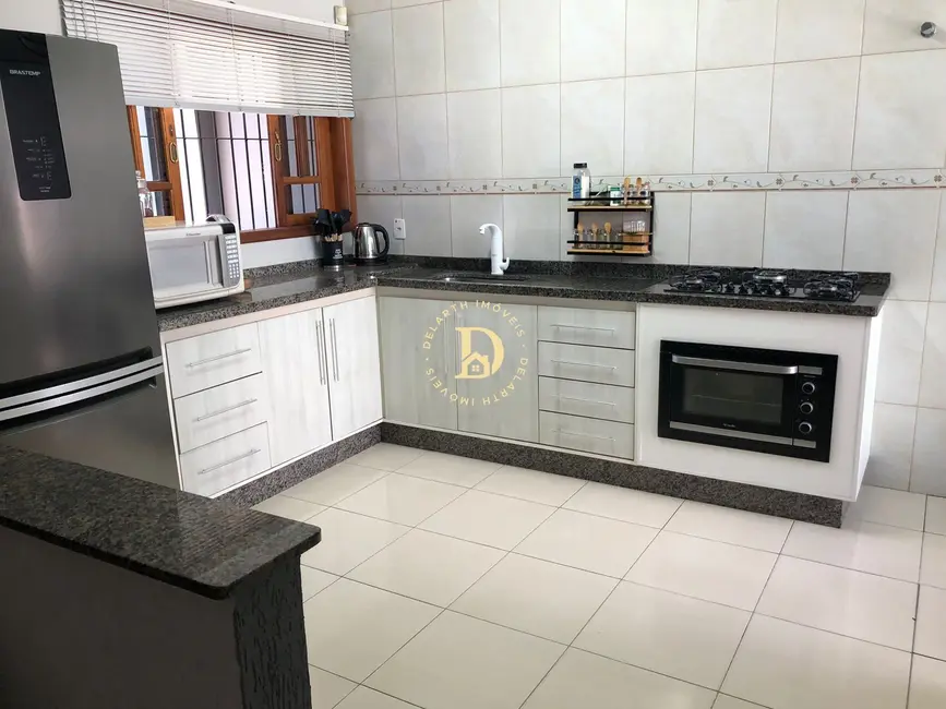 Foto 8 de Casa com 2 quartos à venda, 84m2 em Loteamento Villa Branca, Jacarei - SP