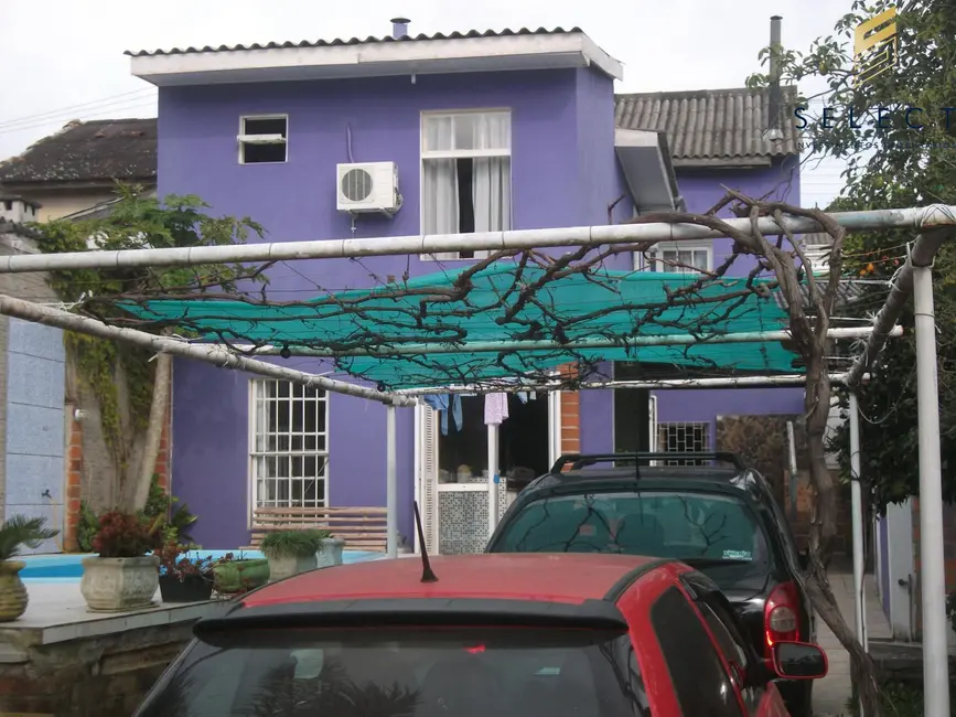 Foto 1 de Casa com 3 quartos à venda, 86m2 em Centro, Santa Maria - RS