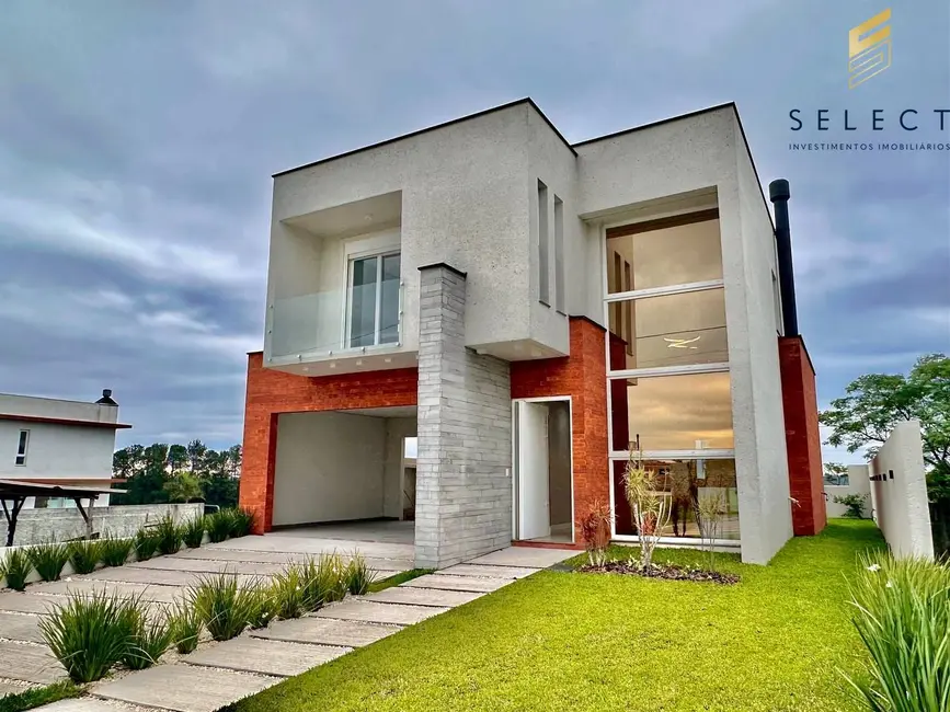 Foto 1 de Casa de Condomínio com 3 quartos à venda, 230m2 em Tomazetti, Santa Maria - RS