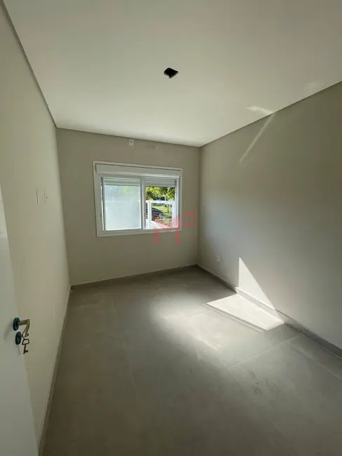 Sobrado com 3 quartos à venda em Capao Da Canoa - RS - imagem 9 Foto 9 de Sobrado com 3 quartos à venda em Capao Da Canoa - RS