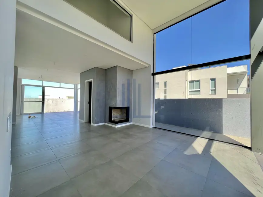 Foto 4 de Casa de Condomínio com 3 quartos à venda, 240m2 em Tomazetti, Santa Maria - RS