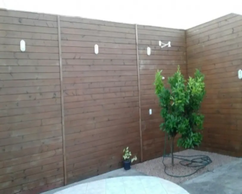 Foto 2 de Casa com 3 quartos à venda, 112m2 em Tramandai - RS