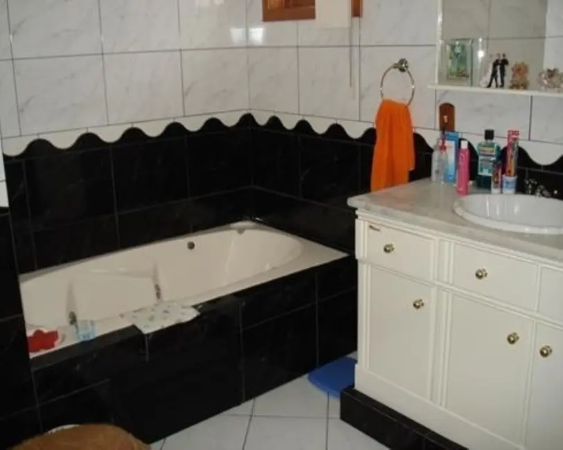 Foto 7 de Casa com 4 quartos à venda, 305m2 em Porto Alegre - RS