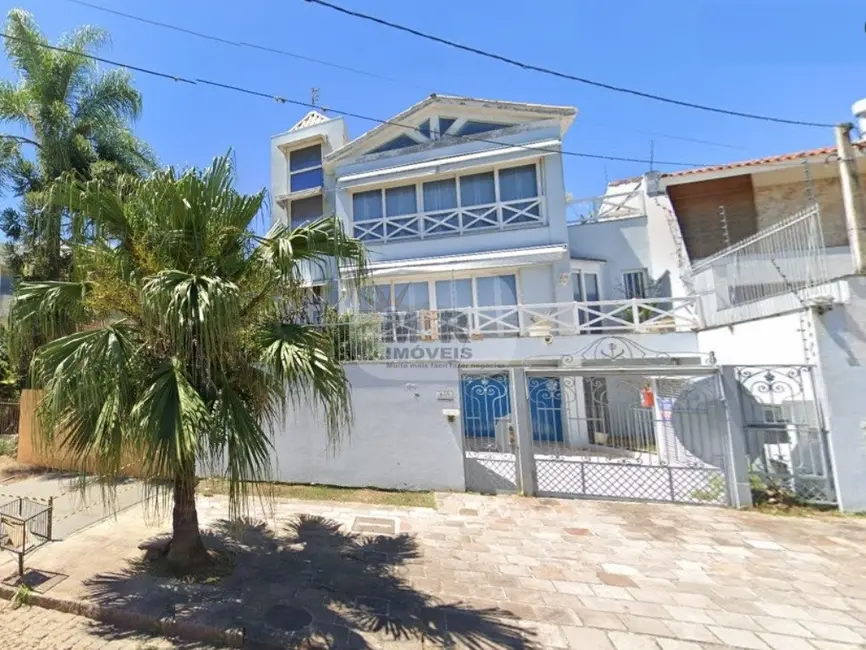 Foto 1 de Casa com 4 quartos à venda, 459m2 em Chácara das Pedras, Porto Alegre - RS