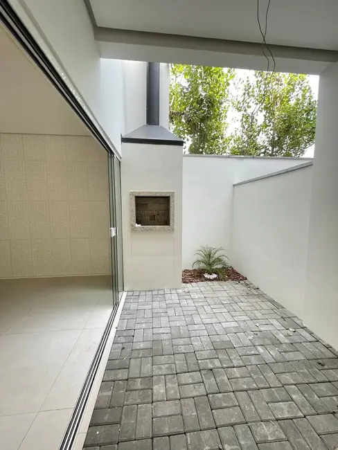 Sobrado com 3 quartos à venda, 122m2 em Estância Velha, Canoas - RS - imagem 9 Foto 9 de Sobrado com 3 quartos à venda, 122m2 em Estância Velha, Canoas - RS