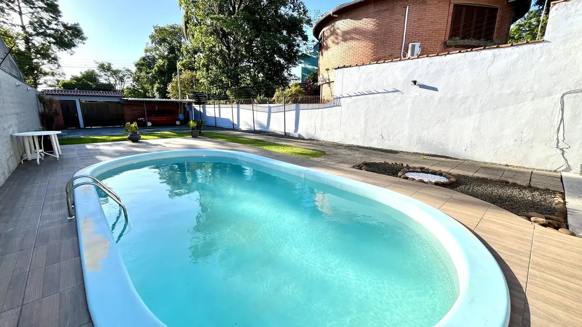 Casa com 3 quartos à venda, 106m2 em Niterói, Canoas - RS - imagem 5 Foto 5 de Casa com 3 quartos à venda, 106m2 em Niterói, Canoas - RS