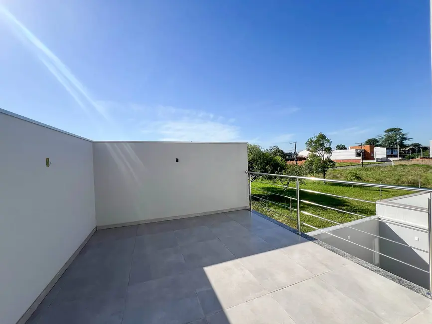 Sobrado com 3 quartos à venda, 220m2 em Estância Velha, Canoas - RS - imagem 9 Foto 9 de Sobrado com 3 quartos à venda, 220m2 em Estância Velha, Canoas - RS