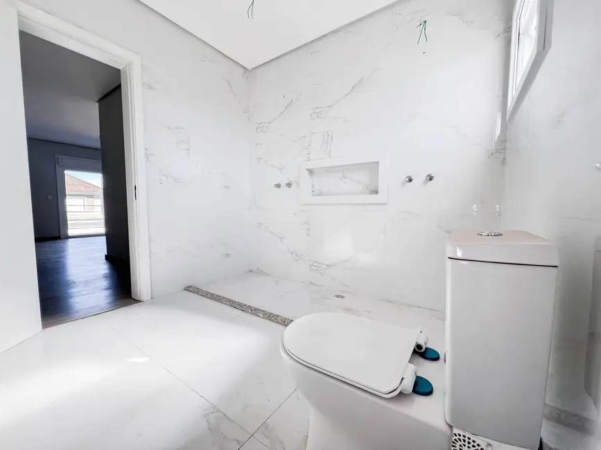 Sobrado com 3 quartos à venda, 220m2 em Estância Velha, Canoas - RS - imagem 8 Foto 8 de Sobrado com 3 quartos à venda, 220m2 em Estância Velha, Canoas - RS