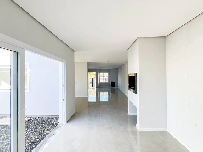 Sobrado com 3 quartos à venda, 220m2 em Estância Velha, Canoas - RS - imagem 7 Foto 7 de Sobrado com 3 quartos à venda, 220m2 em Estância Velha, Canoas - RS