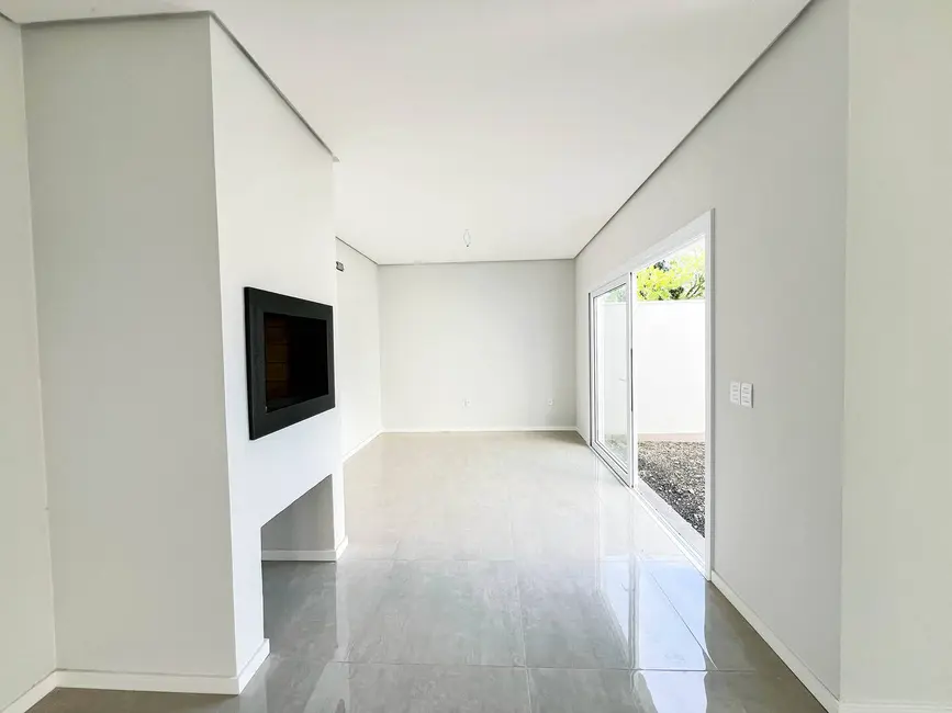 Sobrado com 3 quartos à venda, 220m2 em Estância Velha, Canoas - RS - imagem 4 Foto 4 de Sobrado com 3 quartos à venda, 220m2 em Estância Velha, Canoas - RS