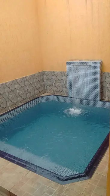 Casa com 2 quartos à venda, 150m2 em Caiçara, Praia Grande - SP - imagem 1 Foto 1 de Casa com 2 quartos à venda, 150m2 em Caiçara, Praia Grande - SP