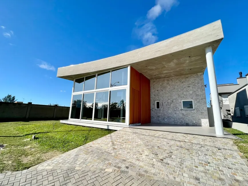 Foto 1 de Casa de Condomínio com 3 quartos à venda em Capao Da Canoa - RS