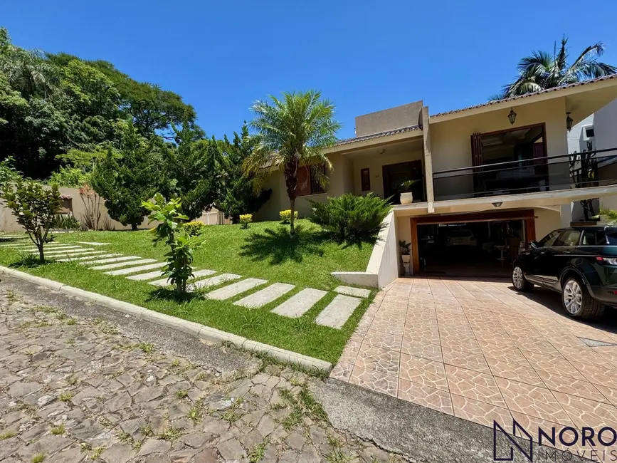 Foto 1 de Casa de Condomínio com 6 quartos à venda, 315m2 em Nossa Senhora do Perpétuo Socorro, Santa Maria - RS