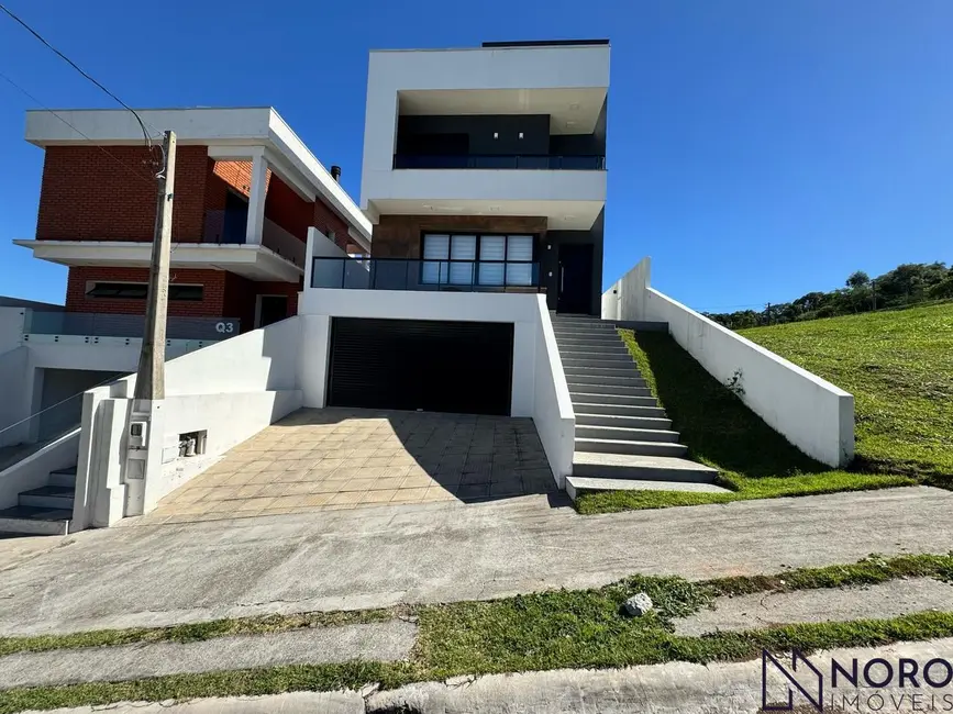 Foto 1 de Casa de Condomínio com 3 quartos à venda, 297m2 em Tomazetti, Santa Maria - RS