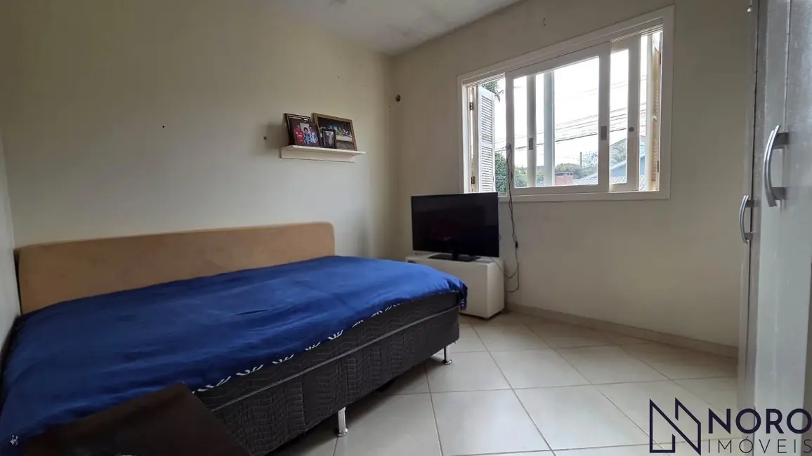 Casa com 3 quartos à venda, 137m2 em Dom Antônio Reis, Santa Maria - RS - imagem 7 Foto 7 de Casa com 3 quartos à venda, 137m2 em Dom Antônio Reis, Santa Maria - RS