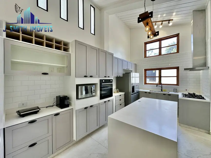 Foto 1 de Casa com 4 quartos à venda, 243m2 em Petit Village, Cotia - SP