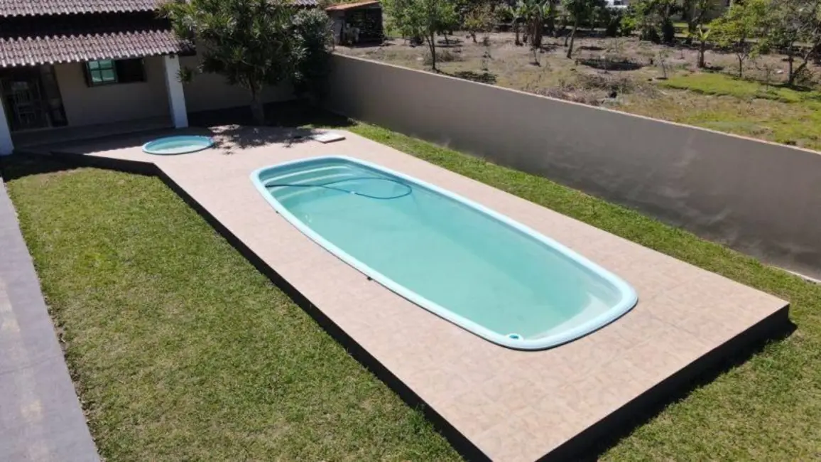 Casa com 3 quartos à venda, 112m2 em Tramandai - RS - imagem 4 Foto 4 de Casa com 3 quartos à venda, 112m2 em Tramandai - RS