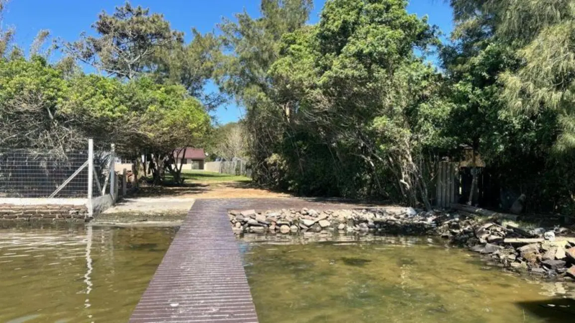 Foto 2 de Casa com 3 quartos à venda, 112m2 em Tramandai - RS