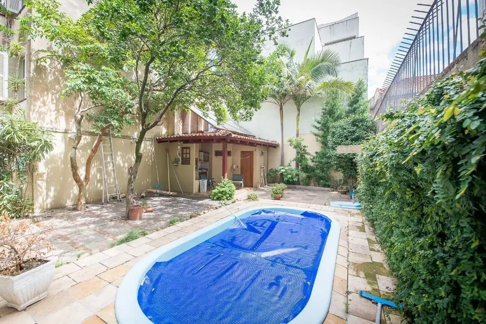 Casa com 4 quartos à venda, 272m2 em Rio Branco, Porto Alegre - RS - imagem 8 Foto 8 de Casa com 4 quartos à venda, 272m2 em Rio Branco, Porto Alegre - RS
