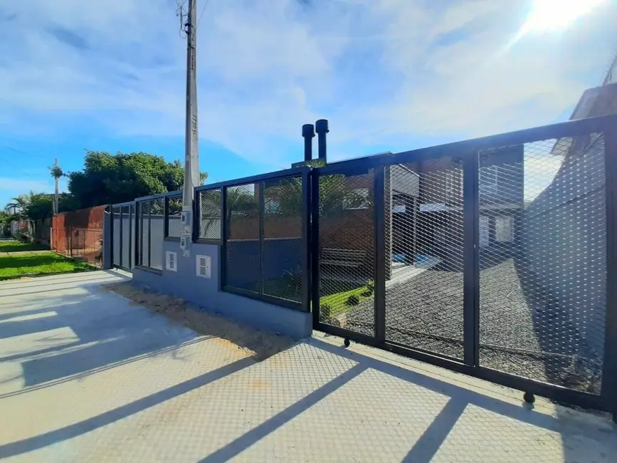 Casa com 3 quartos à venda, 118m2 em Estância Velha, Canoas - RS - imagem 2 Foto 2 de Casa com 3 quartos à venda, 118m2 em Estância Velha, Canoas - RS