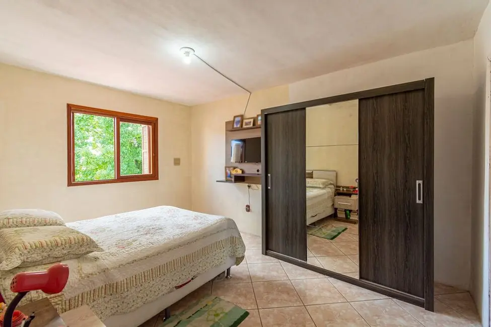 Casa com 4 quartos à venda, 165m2 em Igara, Canoas - RS - imagem 6 Foto 6 de Casa com 4 quartos à venda, 165m2 em Igara, Canoas - RS