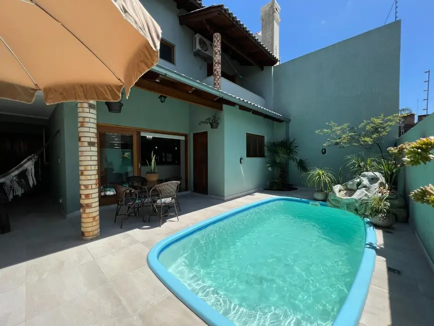 Casa com 3 quartos à venda, 210m2 em Canoas - RS - imagem 8 Foto 8 de Casa com 3 quartos à venda, 210m2 em Canoas - RS