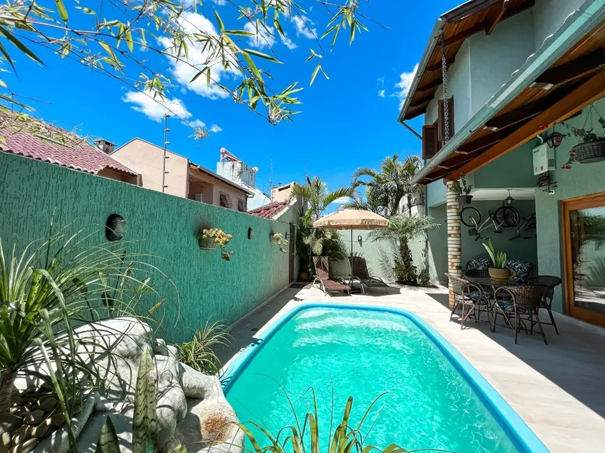 Casa com 3 quartos à venda, 210m2 em Canoas - RS - imagem 7 Foto 7 de Casa com 3 quartos à venda, 210m2 em Canoas - RS