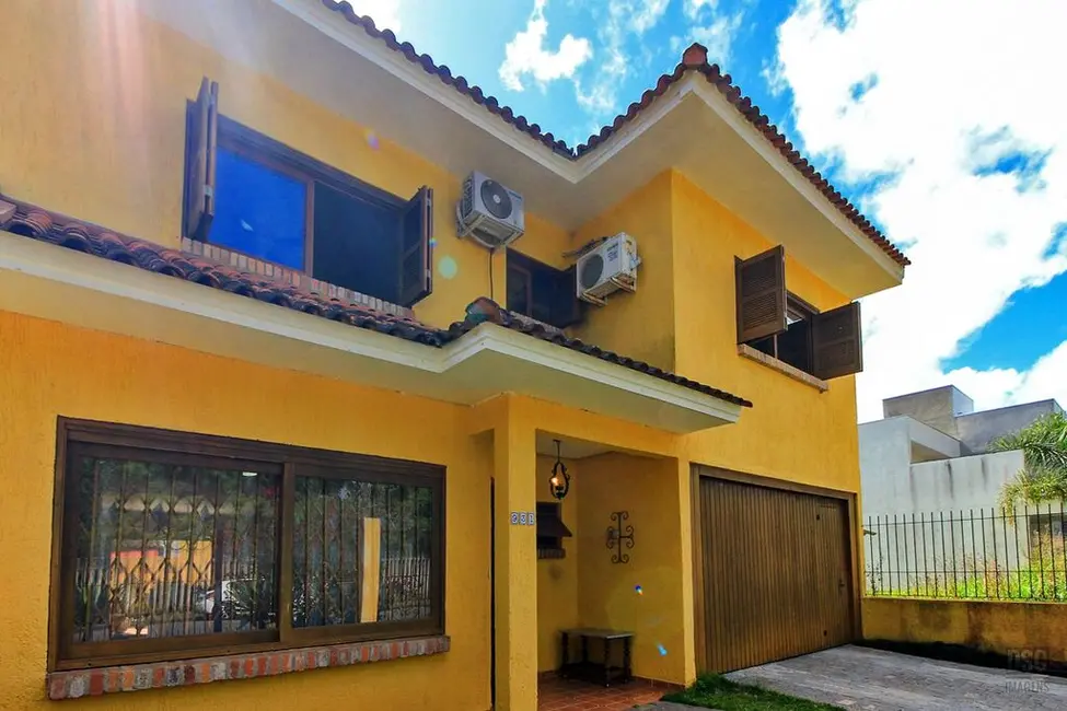 Foto 2 de Casa com 3 quartos à venda, 197m2 em Hípica, Porto Alegre - RS