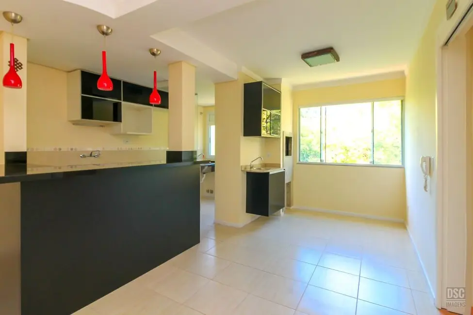 Foto 2 de Apartamento com 2 quartos à venda, 55m2 em Guarujá, Porto Alegre - RS