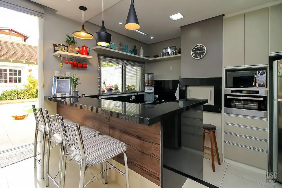 Foto 9 de Casa com 3 quartos à venda, 290m2 em Guarujá, Porto Alegre - RS