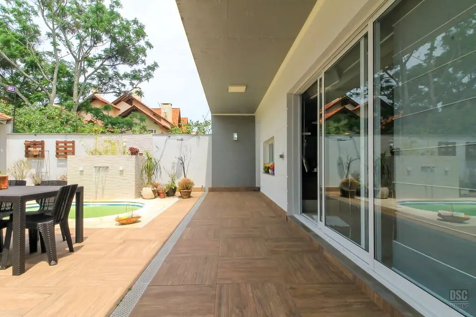 Foto 5 de Casa com 3 quartos à venda, 290m2 em Guarujá, Porto Alegre - RS