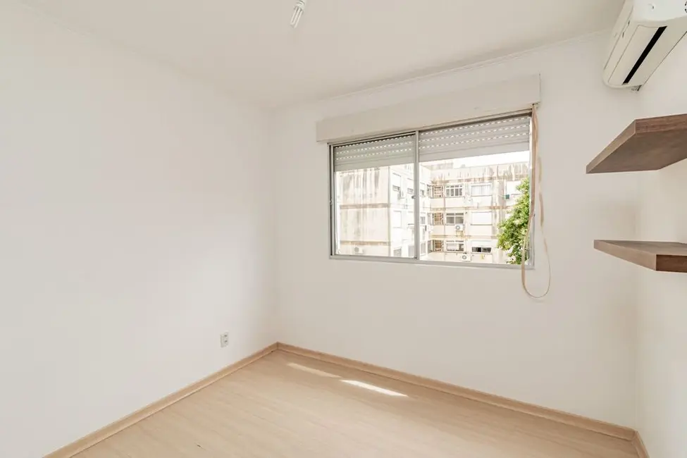 Apartamento com 2 quartos à venda, 56m2 em Santo Antônio, Porto Alegre - RS - imagem 6 Foto 6 de Apartamento com 2 quartos à venda, 56m2 em Santo Antônio, Porto Alegre - RS