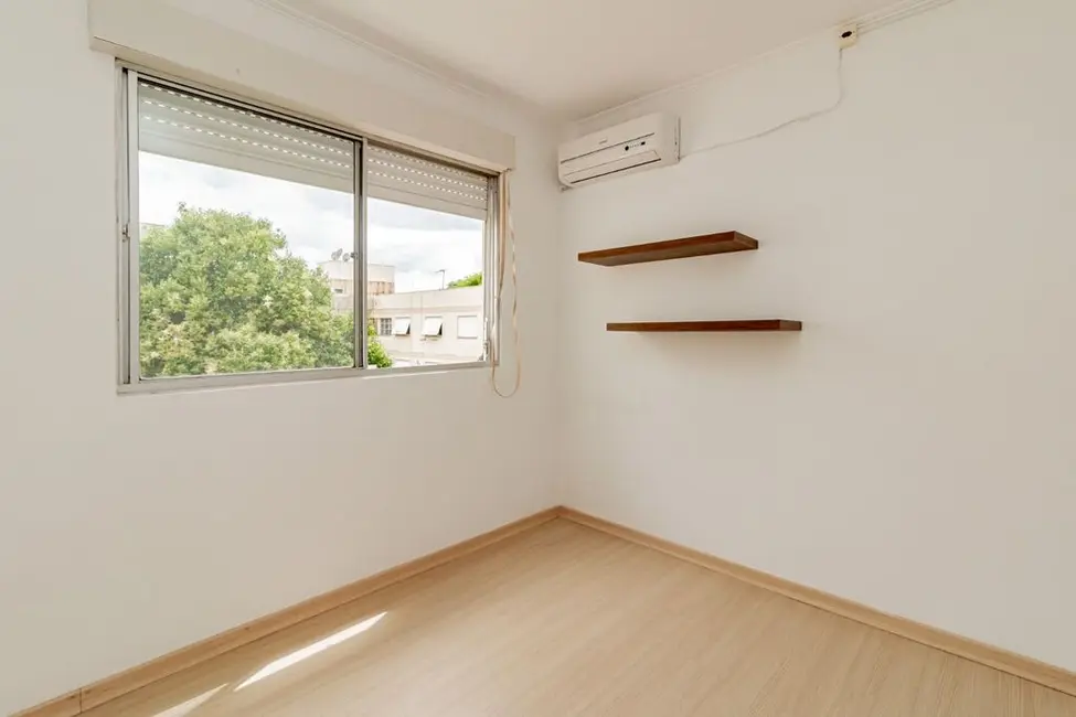 Apartamento com 2 quartos à venda, 56m2 em Santo Antônio, Porto Alegre - RS - imagem 8 Foto 8 de Apartamento com 2 quartos à venda, 56m2 em Santo Antônio, Porto Alegre - RS