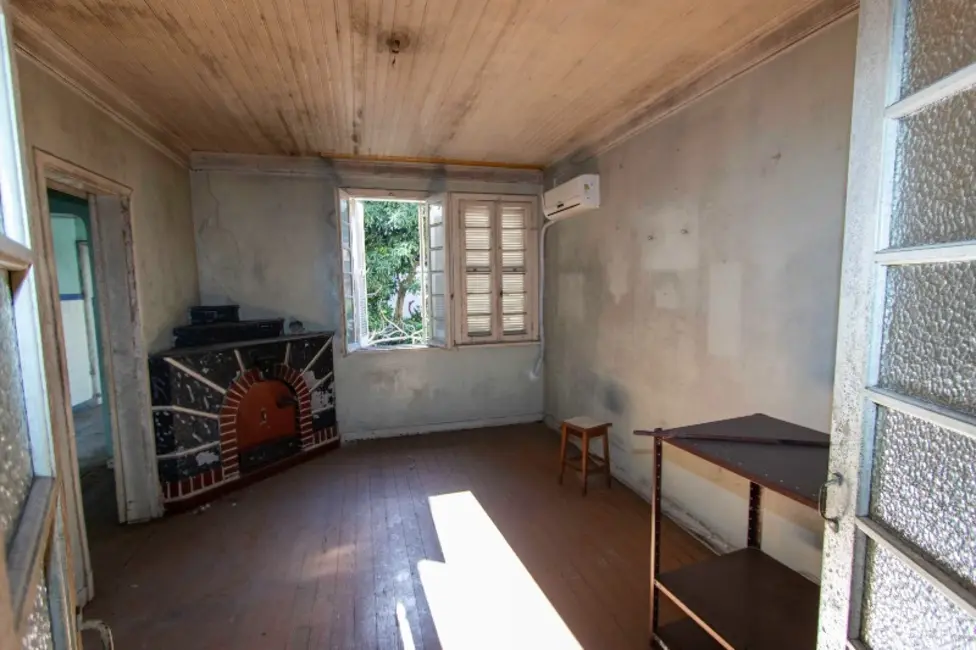Casa com 5 quartos à venda, 144m2 em Independência, Porto Alegre - RS - imagem 3 Foto 3 de Casa com 5 quartos à venda, 144m2 em Independência, Porto Alegre - RS
