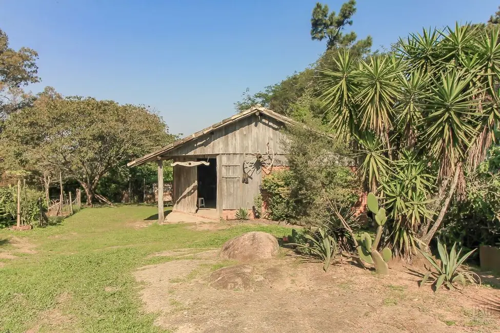 Foto 5 de Casa com 4 quartos à venda, 200m2 em Vila Nova, Porto Alegre - RS