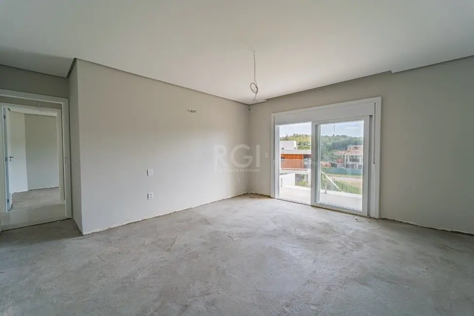 Foto 2 de Casa de Condomínio com 3 quartos à venda, 300m2 em Vila Nova, Porto Alegre - RS