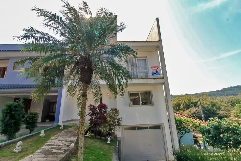 Foto 2 de Casa de Condomínio com 3 quartos à venda, 205m2 em Vila Nova, Porto Alegre - RS