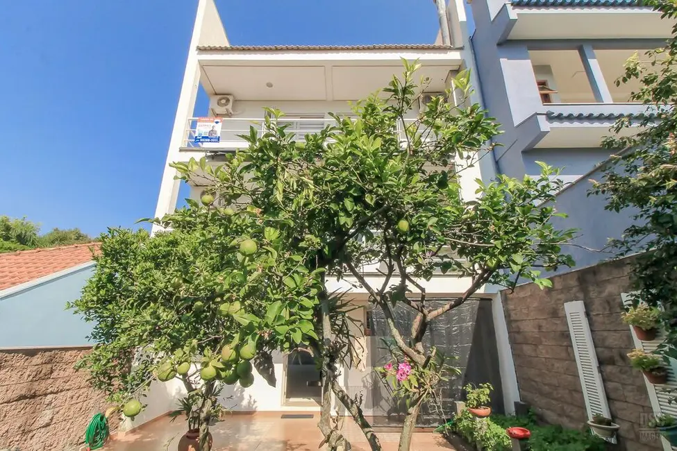 Foto 8 de Casa de Condomínio com 3 quartos à venda, 205m2 em Vila Nova, Porto Alegre - RS