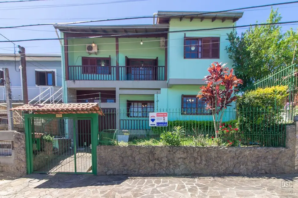 Foto 3 de Casa com 3 quartos à venda, 216m2 em Vila Nova, Porto Alegre - RS