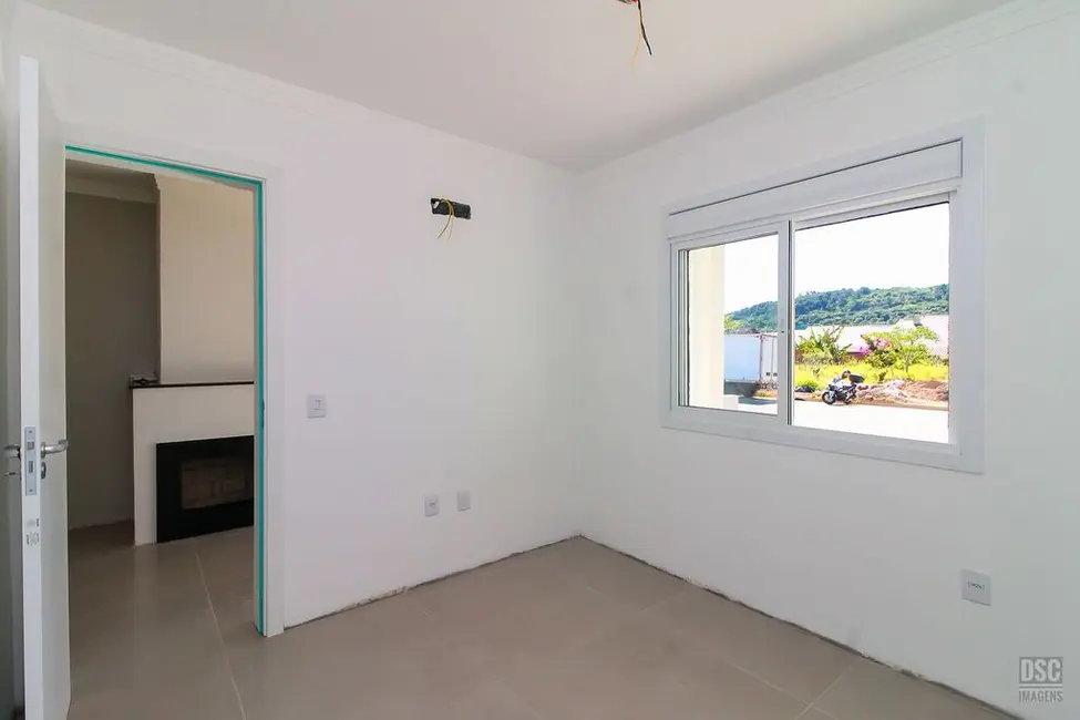 Casa com 3 quartos à venda, 90m2 em Hípica, Porto Alegre - RS - imagem 3 Foto 3 de Casa com 3 quartos à venda, 90m2 em Hípica, Porto Alegre - RS