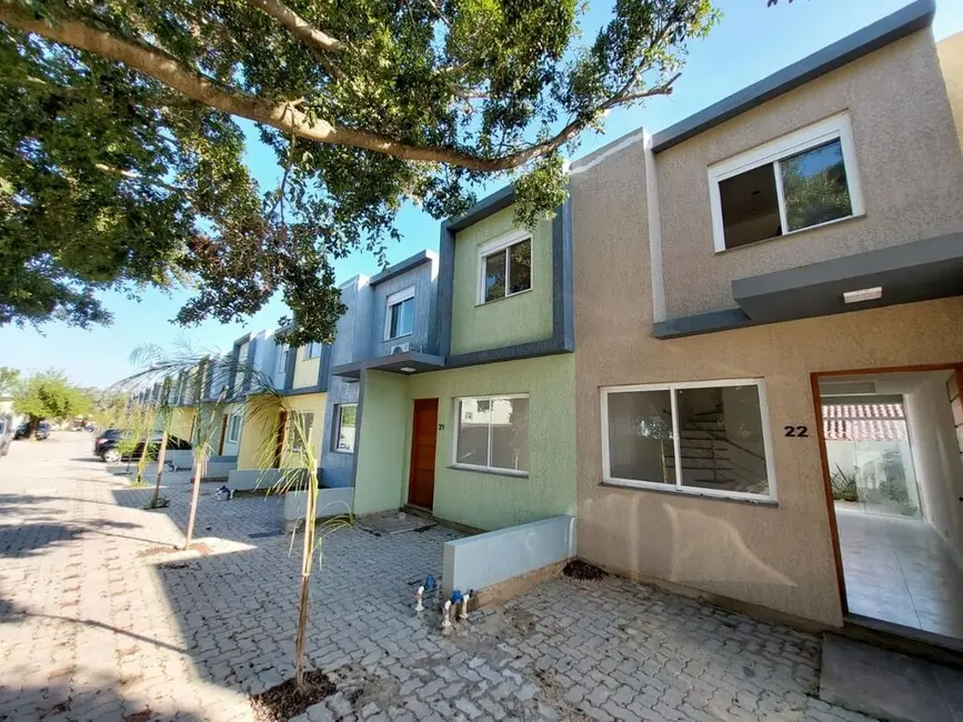Casa de Condomínio com 2 quartos à venda, 64m2 em Vila Nova, Porto Alegre - RS - imagem 2 Foto 2 de Casa de Condomínio com 2 quartos à venda, 64m2 em Vila Nova, Porto Alegre - RS