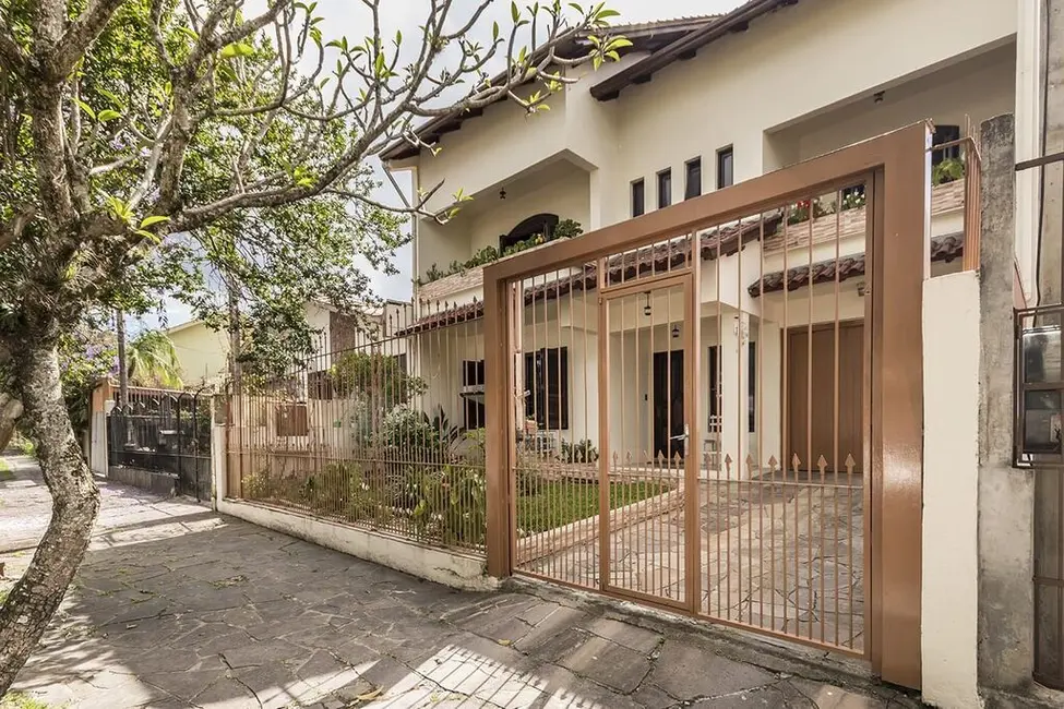 Foto 1 de Casa com 4 quartos à venda, 363m2 em Jardim Itu, Porto Alegre - RS
