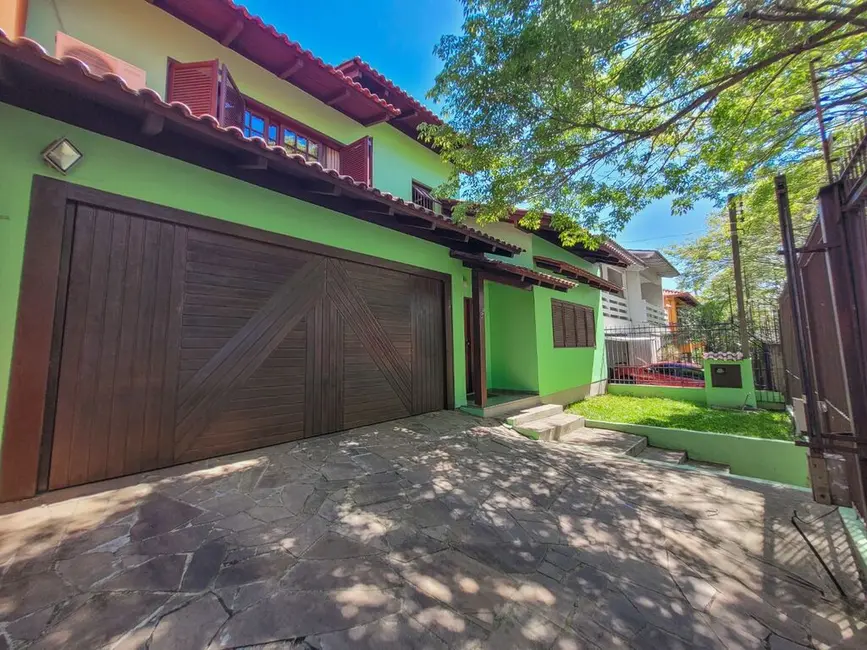 Foto 2 de Casa com 4 quartos à venda, 267m2 em Jardim Itu, Porto Alegre - RS