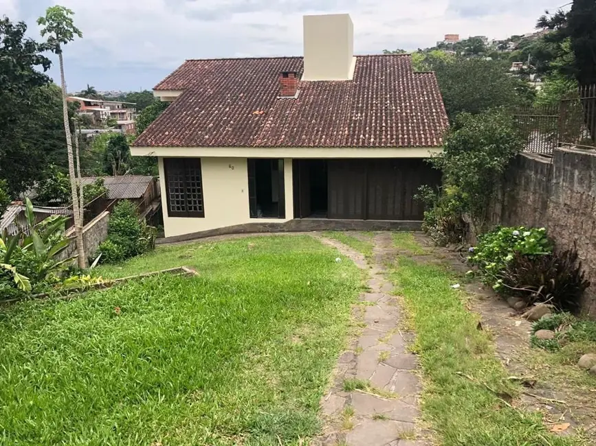 Foto 2 de Casa com 4 quartos à venda, 242m2 em Cascata, Porto Alegre - RS
