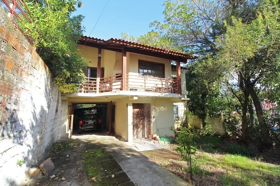 Casa com 4 quartos à venda, 300m2 em Glória, Porto Alegre - RS - imagem 1 Foto 1 de Casa com 4 quartos à venda, 300m2 em Glória, Porto Alegre - RS
