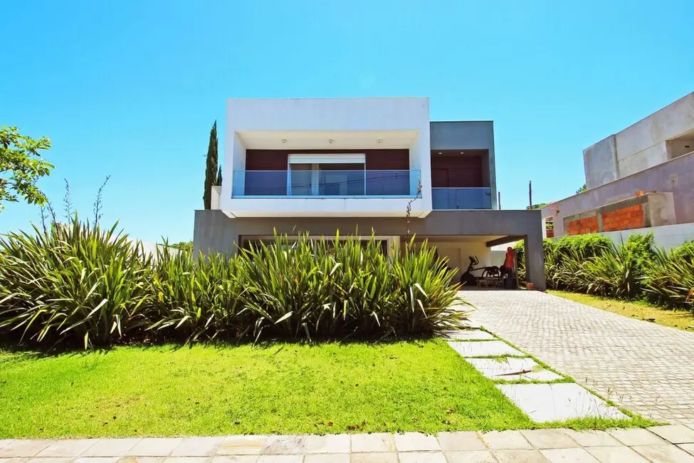 Foto 1 de Casa de Condomínio com 4 quartos à venda, 341m2 em Vila Nova, Porto Alegre - RS